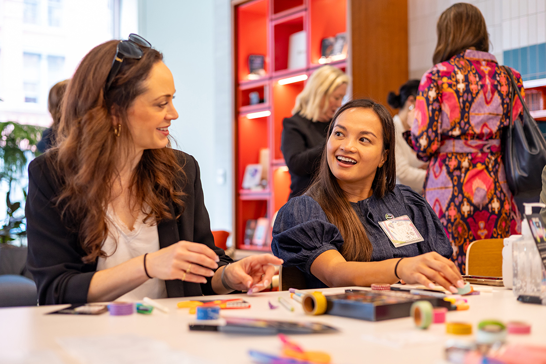 Diverse group of professionals collaborating on an activity that strengthens teamwork and innovation.