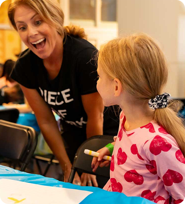 The Center volunteer works with youth at creativity program in South Florida. The Center volunteer works with youth at creativity program in South Florida.